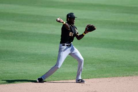 SARASOTA, FLORIDA – MARCH 15: Oneil Cruz #61 of the Pittsburgh Pirates fields a ball during the sixth inning against the Baltimore Orioles during a spring training game at Ed Smith Stadium on March 15, 2021 in Sarasota, Florida. (Photo by Douglas P. DeFelice/Getty Images)