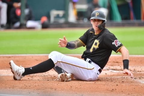 BRADENTON, FLORIDA – MARCH 22: Kevin Newman #27 of the Pittsburgh Pirates reacts after scoring in the second inning against the Baltimore Orioles during a spring training game on March 22, 2021 at LECOM Park in Bradenton, Florida. (Photo by Julio Aguilar/Getty Images)