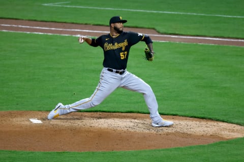 CINCINNATI, OHIO – APRIL 05: Luis Oviedo #57 of the Pittsburgh Pirates pitches during the game against the Cincinnati Reds at Great American Ball Park on April 5, 2021 in Cincinnati, Ohio. Cincinnati defeated Pittsburgh 5-3. (Photo by Kirk Irwin/Getty Images)