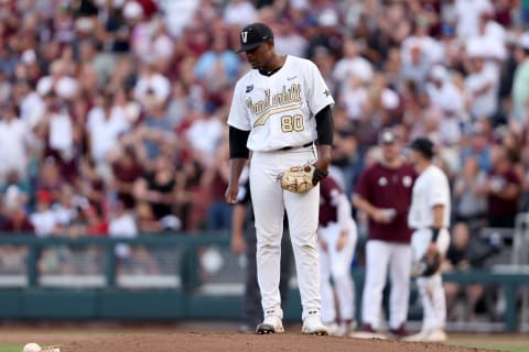 OMAHA, NEBRASKA – JUNE 30: Starting pitcher Kumar Rocker #80 of the Vanderbilt reacts after giving up a run against Luke Hancock #20 of the Mississippi St. in the top of the fifth inning during game three of the College World Series Championship at TD Ameritrade Park Omaha on June 30, 2021 in Omaha, Nebraska. (Photo by Sean M. Haffey/Getty Images)