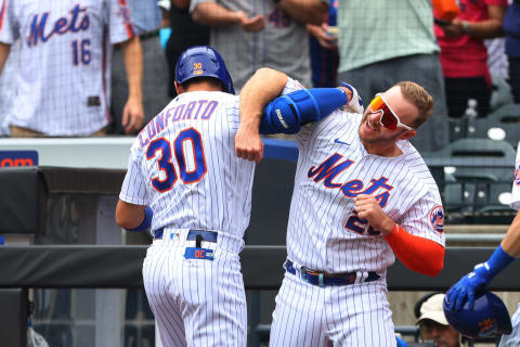 NEW YORK, NY – JULY 11: Michael Conforto #30 of the New York Mets is congratulated by Pete Alonso #20 after he hit a three-run home run against the Pittsburgh Pirates during the first inning of a game at Citi Field on July 11, 2021 in New York City. (Photo by Rich Schultz/Getty Images)