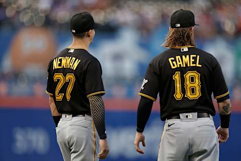 NEW YORK, NY – JULY 9: Kevin Newman #27 of the Pittsburgh Pirates talks to Ben Gamel #18 of the Pittsburgh Pirates as they warm up before taking on the New York Mets at Citi Field on July 9, 2021 in the Flushing neighborhood of the Queens borough of New York City. (Photo by Adam Hunger/Getty Images)