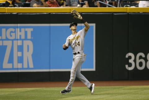 PHOENIX, ARIZONA – JULY 21: Left fielder Jared Oliva #14 of the Pittsburgh Pirates catches a fly ball hit by Josh Rojas #10 of the Arizona Diamondbacks during the first inning of the MLB game at Chase Field on July 21, 2021 in Phoenix, Arizona. (Photo by Ralph Freso/Getty Images)