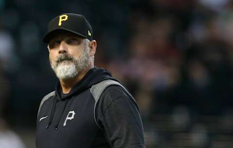 PHOENIX, ARIZONA – JULY 21: Manager Derek Shelton #17 of the Pittsburgh Pirates walks from the mound after a pitching change during the sixth inning of the MLB game against the Arizona Diamondbacks at Chase Field on July 21, 2021 in Phoenix, Arizona. (Photo by Ralph Freso/Getty Images)