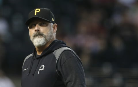 PHOENIX, ARIZONA – JULY 21: Manager Derek Shelton #17 of the Pittsburgh Pirates walks from the mound after a pitching change during the sixth inning of the MLB game against the Arizona Diamondbacks at Chase Field on July 21, 2021 in Phoenix, Arizona. (Photo by Ralph Freso/Getty Images)