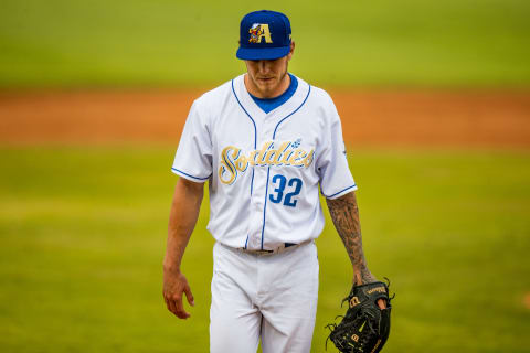 AMARILLO, TEXAS – AUGUST 01: Pitcher Levi Kelly #32 of the Amarillo Sod Poodles walks to the dugout during the second game of a double-header against the San Antonio Missions at HODGETOWN Stadium on August 01, 2021 in Amarillo, Texas. (Photo by John E. Moore III/Getty Images)