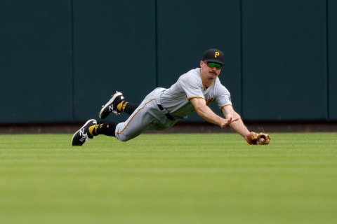 CINCINNATI, OH – AUGUST 08: Bryan Reynolds #10 of the Pittsburgh Pirates makes a diving catch during the game against the Cincinnati Reds at Great American Ball Park on August 8, 2021 in Cincinnati, Ohio. Cincinnati defeated Pittsburgh 3-2. (Photo by Kirk Irwin/Getty Images)