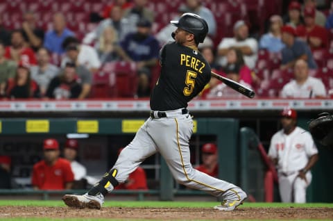 CINCINNATI, OHIO – SEPTEMBER 21: Michael Perez #5 of the Pittsburgh Pirates hits a RBI single in the 8th inning against the Cincinnati Reds at Great American Ball Park on September 21, 2021 in Cincinnati, Ohio. (Photo by Andy Lyons/Getty Image