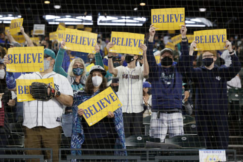 SEATTLE, WASHINGTON – OCTOBER 03: Fans cheer before the game between the Seattle Mariners and the Los Angeles Angels at T-Mobile Park on October 03, 2021 in Seattle, Washington. (Photo by Steph Chambers/Getty Images)