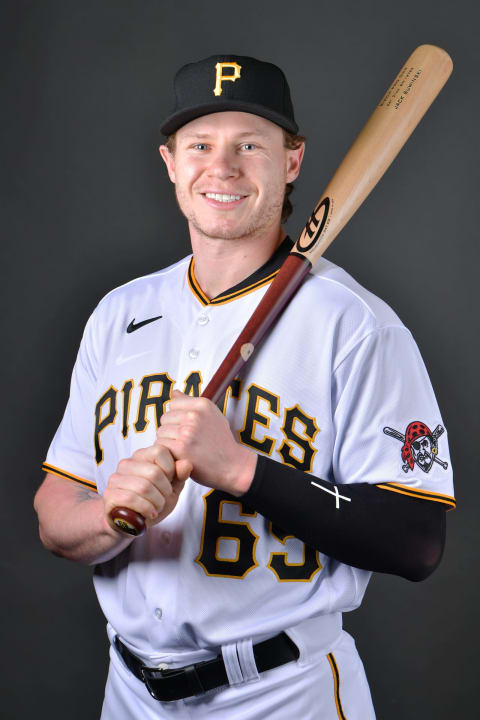 BRADENTON, FLORIDA – MARCH 16: Jack Suwinski #65 of the Pittsburgh Pirates poses for a picture during the 2022 Photo Day at LECOM Park on March 16, 2022 in Bradenton, Florida. (Photo by Julio Aguilar/Getty Images)