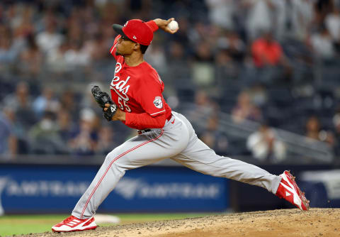 NEW YORK, NEW YORK – JULY 14: Dauri Moreta #55 of the Cincinnati Reds delivers a pitch against the New York Yankees at Yankee Stadium on July 14, 2022 in the Bronx borough of New York City. The Cincinnati Reds defeated the New York Yankees 7-6 in 10 innings. (Photo by Elsa/Getty Images)