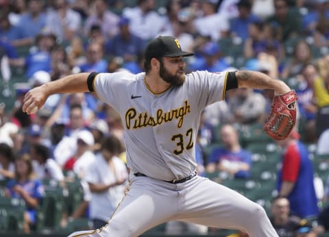 CHICAGO, ILLINOIS – JULY 26: Bryse Wilson #32 of the Pittsburgh Pirates throws a pitch during the fourth inning of a game against the Chicago Cubs at Wrigley Field on July 26, 2022 in Chicago, Illinois. (Photo by Nuccio DiNuzzo/Getty Images)