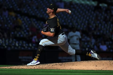 MILWAUKEE, WISCONSIN – AUGUST 29: Robert Stephenson #41 of the Pittsburgh Pirates throws a pitch during a game against the Milwaukee Brewers at American Family Field on August 29, 2022 in Milwaukee, Wisconsin. (Photo by Stacy Revere/Getty Images)