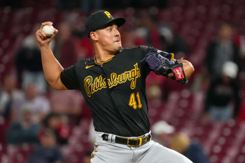 CINCINNATI, OHIO – SEPTEMBER 12: Robert Stephenson #41 of the Pittsburgh Pirates pitches in the seventh inning against the Cincinnati Reds at Great American Ball Park on September 12, 2022 in Cincinnati, Ohio. (Photo by Dylan Buell/Getty Images)