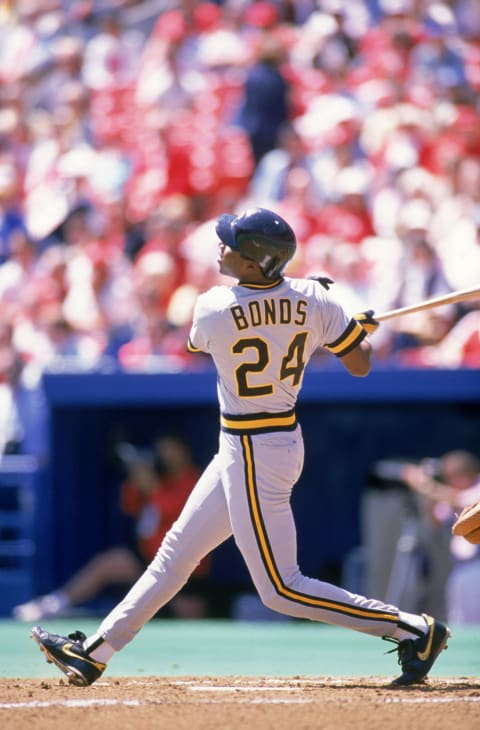 ST. LOUIS – APRIL 7: Barry Bonds #24 of the Pittsburgh Pirates watches the flight of the ball as he follows through on a swing during a game against the St. Louis Cardinals at Busch Stadium on April 7, 1989 in St. Louis, Missouri. (Photo by Rich Pilling/MLB Photos via Getty Images)