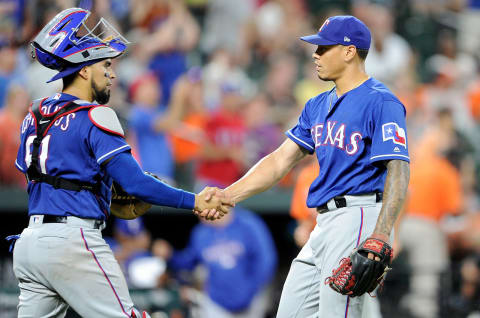 BALTIMORE, MD – JULY 13: Keone Kela #50 of the Texas Rangers celebrates with Robinson Chirinos #61 after a 5-4 victory against the Baltimore Orioles at Oriole Park at Camden Yards on July 13, 2018 in Baltimore, Maryland. (Photo by Greg Fiume/Getty Images)