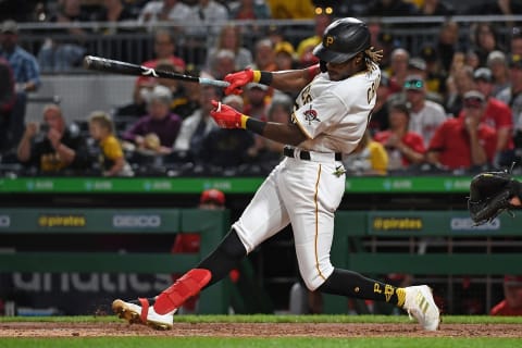 PITTSBURGH, PA – OCTOBER 02: Oneil Cruz #61 of the Pittsburgh Pirates hits an RBI single for his first major league hit in the fifth inning during the game against the Cincinnati Reds at PNC Park on October 2, 2021 in Pittsburgh, Pennsylvania. (Photo by Justin Berl/Getty Images)