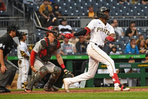 PITTSBURGH, PA – OCTOBER 03: Oneil Cruz #61 of the Pittsburgh Pirates hits a two run home run for his first Major League home run in the ninth inning during the game against the Cincinnati Reds at PNC Park on October 3, 2021 in Pittsburgh, Pennsylvania. (Photo by Justin Berl/Getty Images)