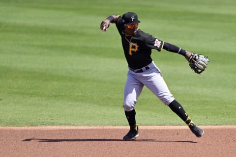 CLEARWATER, FLORIDA – MARCH 05: Rodolfo Castro #64 of the Pittsburgh Pirates fields a ground ball during the first inning against the Philadelphia Phillies during a spring training game at Phillies Spring Training Ball Park on March 05, 2021 in Clearwater, Florida. (Photo by Douglas P. DeFelice/Getty Images)