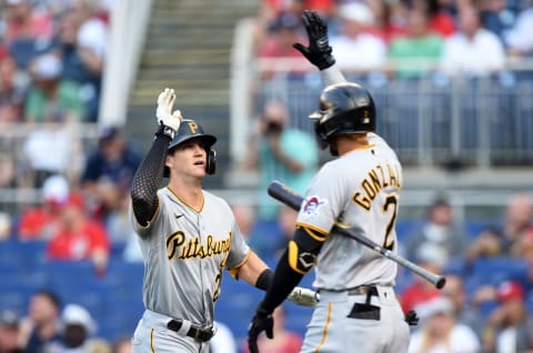 WASHINGTON, DC – JUNE 14: Kevin Newman #27 of the Pittsburgh Pirates celebrates with Erik Gonzalez #2 after hitting a home run in the second inning against the Washington Nationals at Nationals Park on June 14, 2021 in Washington, DC. (Photo by Greg Fiume/Getty Images)