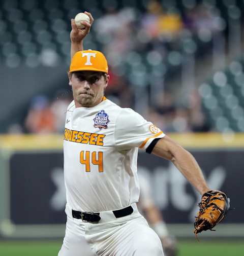 HOUSTON, TEXAS – MARCH 05: Ben Joyce #44 of the Tennessee Volunteers pitches in the back eighth inning against the Baylor Bears during the Shriners Children’s College Classic at Minute Maid Park on March 05, 2022 in Houston, Texas. (Photo by Bob Levey/Getty Images)