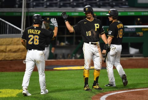 PITTSBURGH, PA – JULY 28: Adam Frazier #26 of the Pittsburgh Pirates celebrates with Bryan Reynolds #10 after scoring in the seventh inning against the Milwaukee Brewers at PNC Park on July 28, 2020 in Pittsburgh, Pennsylvania. (Photo by Joe Sargent/Getty Images)