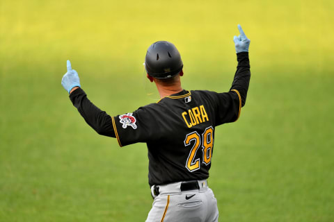 CLEVELAND, OHIO – JULY 20: Third base coach Joey Cora #28 of the Pittsburgh Pirates signals to his runner during the first inning against the Cleveland Indians at Progressive Field on July 20, 2020 in Cleveland, Ohio. (Photo by Jason Miller/Getty Images)