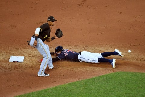 CLEVELAND, OHIO – JULY 20: Cesar Hernandez #7 of the Cleveland Indians steals second as shortstop Erik Gonzalez #2 of the Pittsburgh Pirates waits for the throw during the fifth inning at Progressive Field on July 20, 2020 in Cleveland, Ohio. (Photo by Jason Miller/Getty Images)