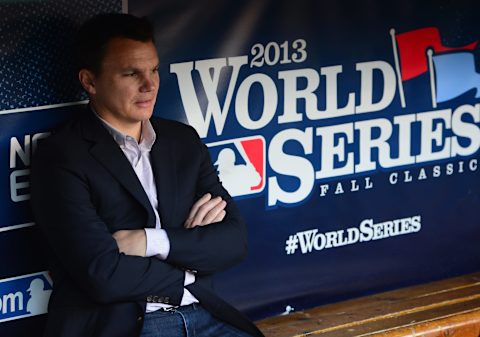 ST. LOUIS, MO – OCTOBER 28: Boston Red Sox General Manager Ben Cherington sits in the dugout prior to Game Five of the 2013 World Series against the St. Louis Cardinals on October 28, 2013 at Busch Stadium in St. Louis, Missouri. (Photo by Michael Ivins/Boston Red Sox/Getty Images)