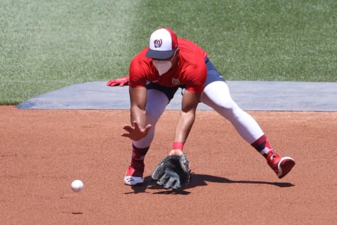 Jul 9, 2020; Washington, DC, United States; Washington Nationals shortstop Wilmer Difo fields a ground ball on day seven of Nationals workouts at Nationals Park. Mandatory Credit: Geoff Burke-USA TODAY Sports