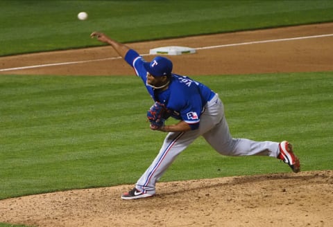 Aug 4, 2020; Oakland, California, USA; Texas Rangers relief pitcher Edinson Volquez (36) pitches the ball against the Oakland Athletics during the ninth inning at Oakland Coliseum. Mandatory Credit: Kelley L Cox-USA TODAY Sports