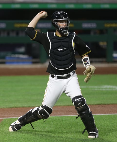 Aug 20, 2020; Pittsburgh, Pennsylvania, USA; Pittsburgh Pirates catcher Jacob Stallings (58) throws to first base to retire Cleveland Indians catcher Beau Taylor (not pictured) during the fourth inning at PNC Park. Mandatory Credit: Charles LeClaire-USA TODAY Sports