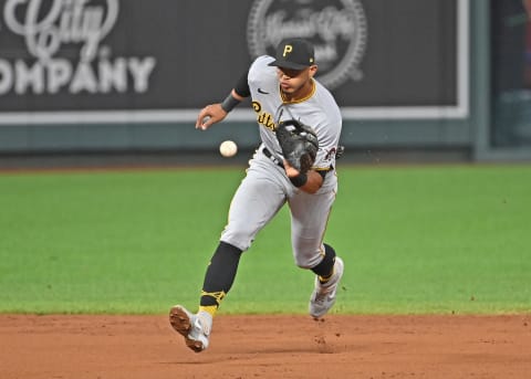 Sep 11, 2020; Kansas City, Missouri, USA; Pittsburgh Pirates shortstop Erik Gonzalez (2) fields a high chopper during the second inning against the Kansas City Royals at Kauffman Stadium. Mandatory Credit: Peter Aiken-USA TODAY Sports