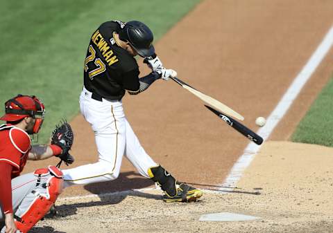 Sep 6, 2020; Pittsburgh, Pennsylvania, USA; Pittsburgh Pirates pinch hitter Kevin Newman (27) breaks his bat against the Cincinnati Reds during the ninth inning at PNC Park. The Pirates won 3-2. Mandatory Credit: Charles LeClaire-USA TODAY Sports