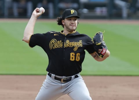 Sep 14, 2020; Cincinnati, Ohio, USA; Pittsburgh Pirates starting pitcher Cody Ponce throws against the Cincinnati Reds in the first inning during Game One of a doubleheader at Great American Ball Park. Mandatory Credit: David Kohl-USA TODAY Sports