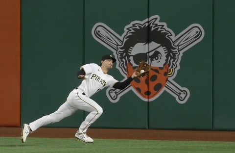 Sep 22, 2020; Pittsburgh, Pennsylvania, USA; Pittsburgh Pirates left fielder Bryan Reynolds (10) makes a running catch to retire Chicago Cubs designated hitter Jose Martinez (not pictured) during the fifth inning at PNC Park. Mandatory Credit: Charles LeClaire-USA TODAY Sports