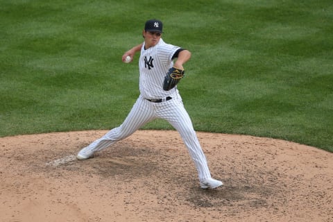 Sep 26, 2020; Bronx, New York, USA; New York Yankees relief pitcher Miguel Yajure (89) pitches against the Miami Marlins during the eighth inning at Yankee Stadium. Mandatory Credit: Brad Penner-USA TODAY Sports