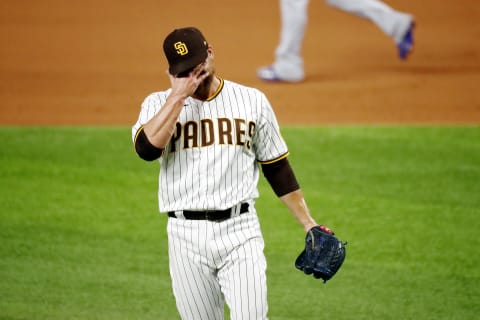 Oct 8, 2020; Arlington, Texas, USA; San Diego Padres relief pitcher Trevor Rosenthal (47), the eleventh pitcher for the team in the game, reacts after hitting Los Angeles Dodgers third baseman Justin Turner (not pictured) with a pitch during the ninth inning during game three of the 2020 NLDS at Globe Life Field. Mandatory Credit: Kevin Jairaj-USA TODAY Sports