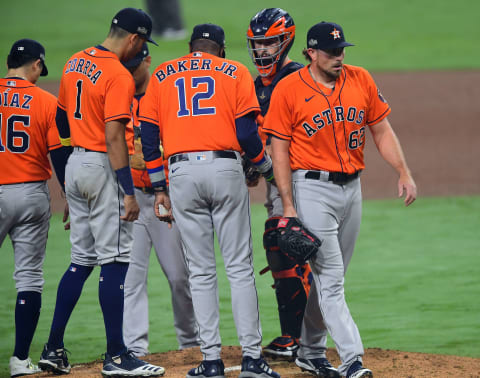 Oct 17, 2020; San Diego, California, USA; Houston Astros starting pitcher Blake Taylor (62) is relieved against the Tampa Bay Rays during the eighth inning in game seven of the 2020 ALCS at Petco Park. Mandatory Credit: Jayne Kamin-Oncea-USA TODAY Sports