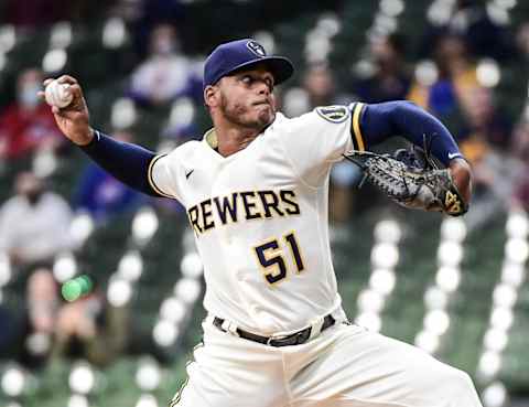 Apr 12, 2021; Milwaukee, Wisconsin, USA; Milwaukee Brewers pitcher Freddy Peralta (51) throws a pitch in the first inning against the Chicago Cubs at American Family Field. Mandatory Credit: Benny Sieu-USA TODAY Sports