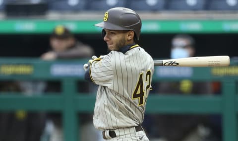 Apr 15, 2021; Pittsburgh, Pennsylvania, USA; San Diego Padres right fielder Tucupita Marcano (16) hits RBI double against the Pittsburgh Pirates during the first inning at PNC Park. Mandatory Credit: Charles LeClaire-USA TODAY Sports