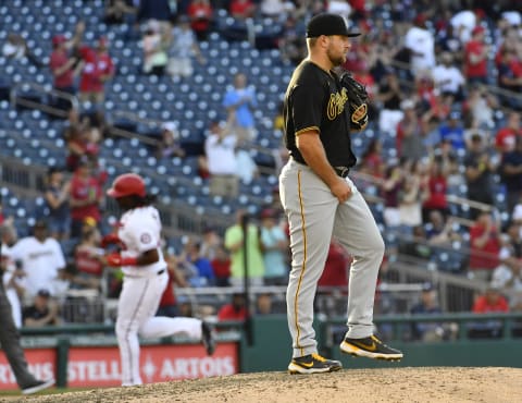 Jun 16, 2021; Washington, District of Columbia, USA; Pittsburgh Pirates relief pitcher David Bednar (51) reacts after giving up a two-run home run to Washington Nationals first baseman Josh Bell (19) during the seventh inning at Nationals Park. Mandatory Credit: Brad Mills-USA TODAY Sports