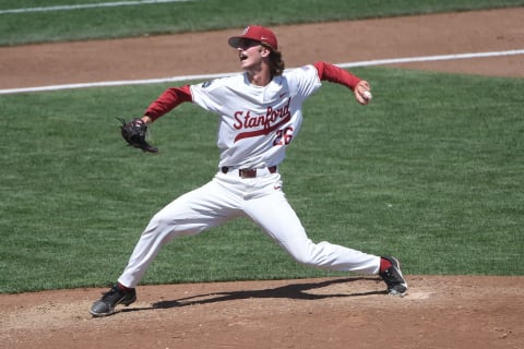 Jun 19, 2021; Omaha, Nebraska, USA; Stanford Cardinal pitcher Quinn Mathews (26) pitches in relief against the NC State Wolfpack at TD Ameritrade Park. Mandatory Credit: Steven Branscombe-USA TODAY Sports