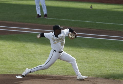 Jun 30, 2021; Omaha, Nebraska, USA; Vanderbilt Commodores pitcher Kumar Rocker (80) throws a pitch against the Mississippi State Bulldogs in the first inning at TD Ameritrade Park. Mandatory Credit: Bruce Thorson-USA TODAY Sports