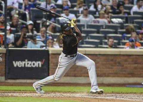 Jul 10, 2021; New York City, New York, USA; Pittsburgh Pirates third baseman KeÕBryan Hayes (13) hits a single against the New York Mets in the third inning at Citi Field. Mandatory Credit: Wendell Cruz-USA TODAY Sports