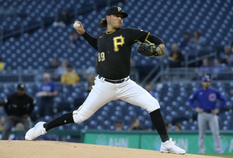 Sep 30, 2021; Pittsburgh, Pennsylvania, USA; Pittsburgh Pirates starting pitcher Miguel Yajure (89) delivers a pitch against the Chicago Cubs during the first inning at PNC Park. Mandatory Credit: Charles LeClaire-USA TODAY Sports