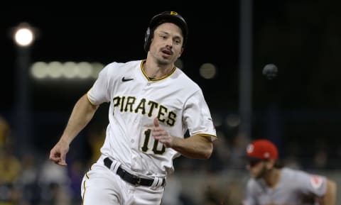 Oct 2, 2021; Pittsburgh, Pennsylvania, USA; Pittsburgh Pirates center fielder Bryan Reynolds (10) runs the bases on his way to scoring a run against the Cincinnati Reds during the fifth inning at PNC Park. Mandatory Credit: Charles LeClaire-USA TODAY Sports