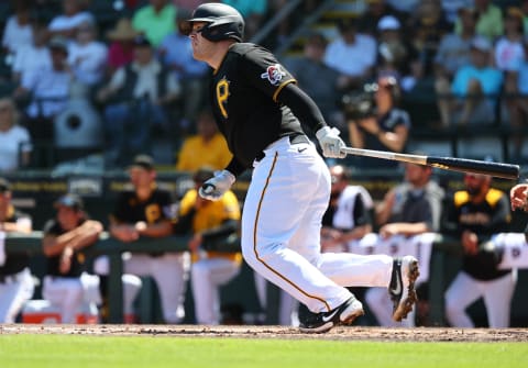 Mar 22, 2022; Bradenton, Florida, USA; Pittsburgh Pirates catcher Roberto Perez (55) singles during the second inning against the Baltimore Orioles during spring training at LECOM Park. Mandatory Credit: Kim Klement-USA TODAY Sports