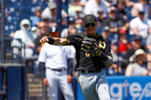 Mar 27, 2022; Tampa, Florida, USA; Pittsburgh Pirates shortstop Diego Castillo (64) throws to first for an out in the third inning against the New York Yankees during spring training at George M. Steinbrenner Field. Mandatory Credit: Nathan Ray Seebeck-USA TODAY Sports