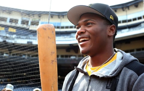 Jul 29, 2022; Pittsburgh, Pennsylvania, USA; Pittsburgh Pirates first round pick Termarr Johnson and fourth overall player drafted in the 2022 MLB Draft on the field before the Pirates host the Philadelphia Phillies at PNC Park. Mandatory Credit: Charles LeClaire-USA TODAY Sports